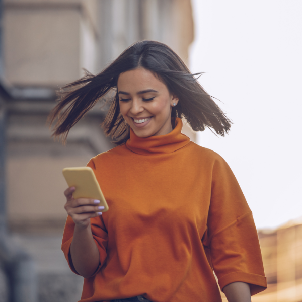 text, woman holding phone