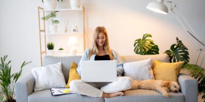 maxxsouth blog, what internet speed to get for college students, college student on couch with dog
