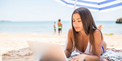 laptop on the beach, tv on the go
