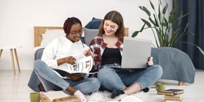 Fiber internet for education, girls doing homework