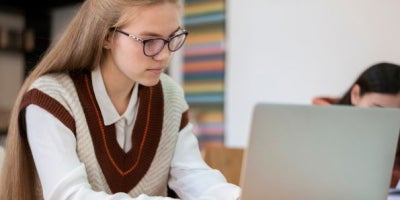 school wifi, slow school internet, girl on laptop