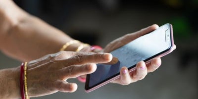 How to Transfer Data From One Phone to Another, woman on phone