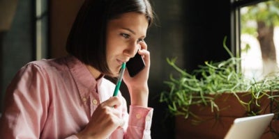 top business apps, business woman on phone
