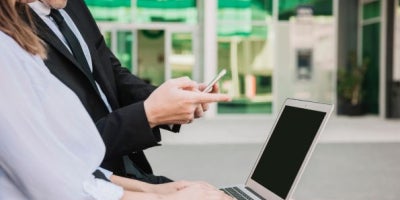secure wifi for business, secure business network, image of business people on laptop