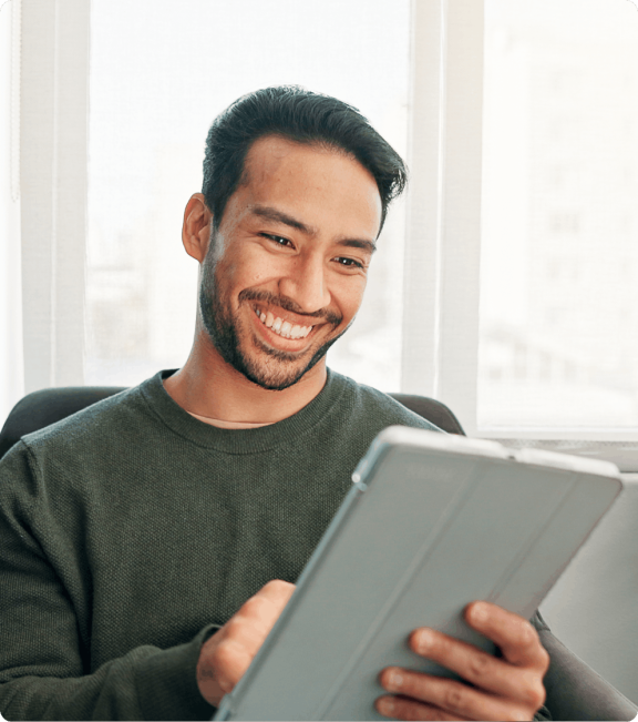 Man sitting and using tablet