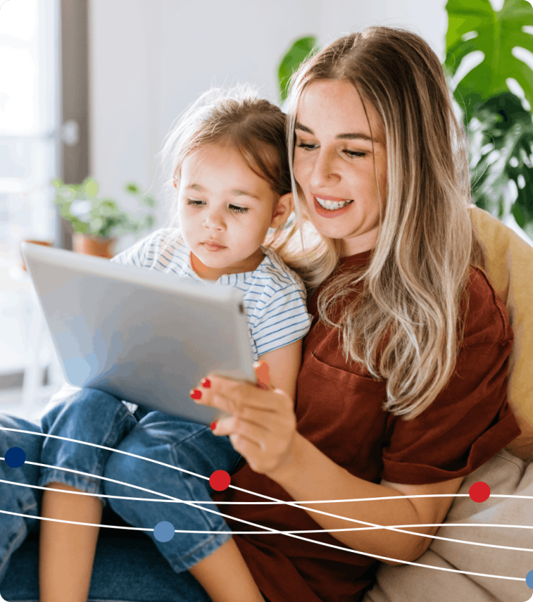 Mother and daughter using tablet